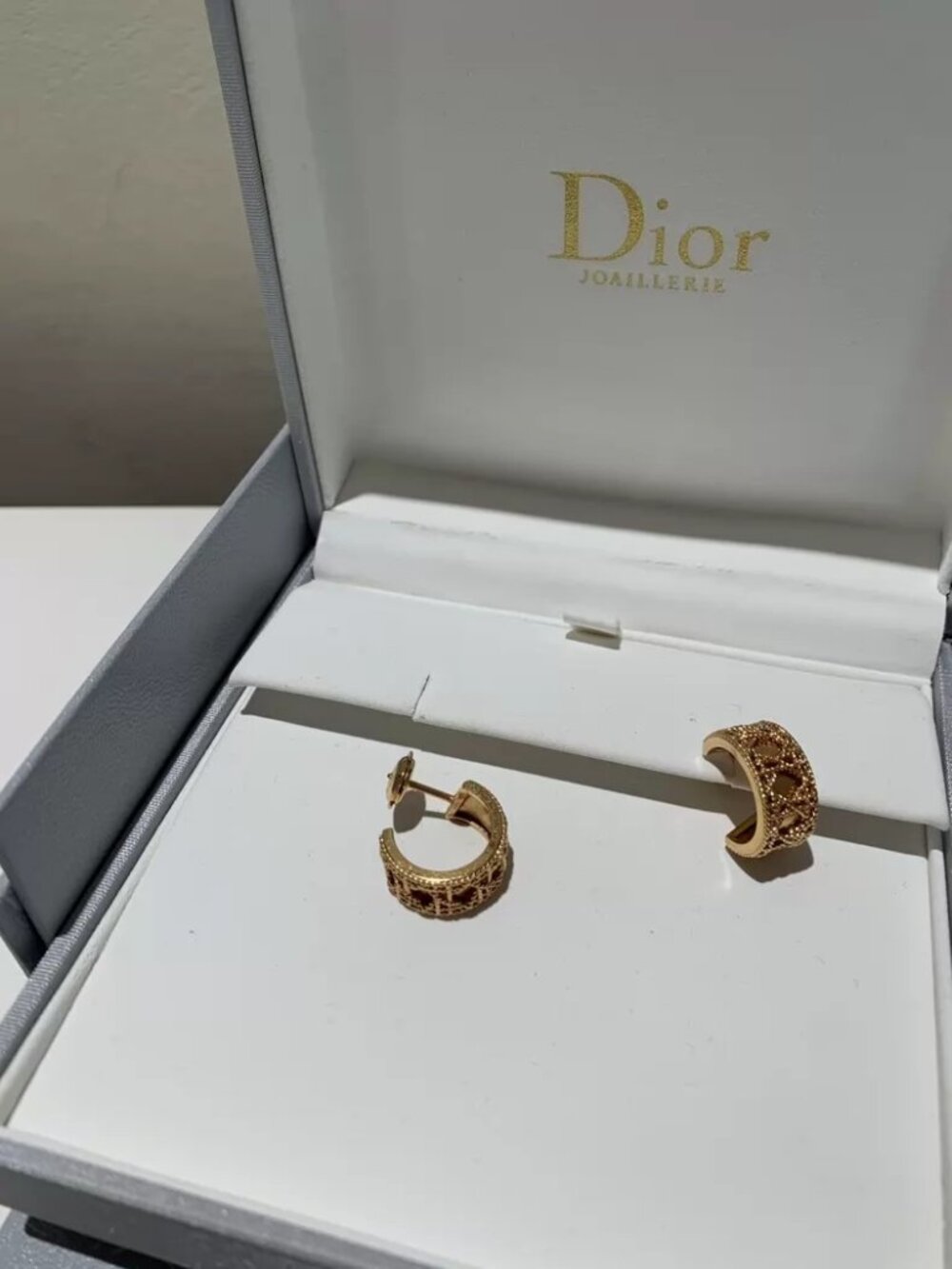Dior rattan patterned gold earrings